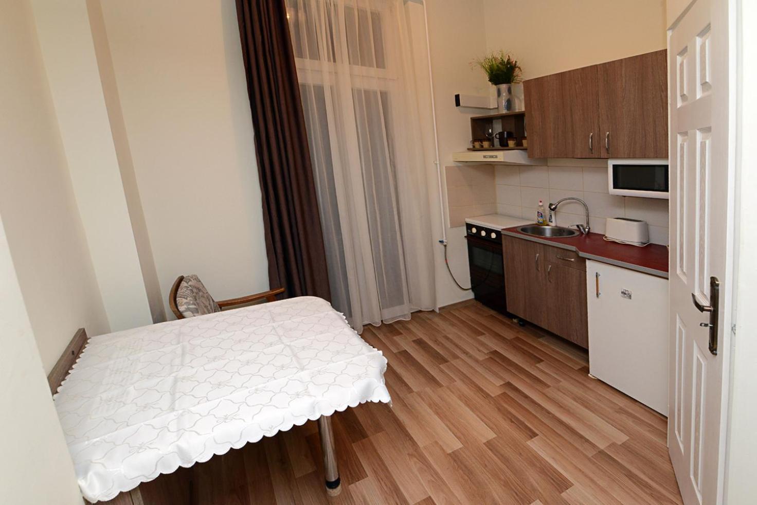 Centrum Apartman Печ Экстерьер фото